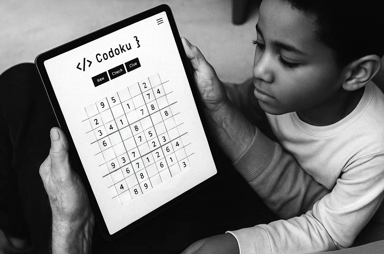 Photo of a child and elderly person looking at a Sudoku game on a tablet